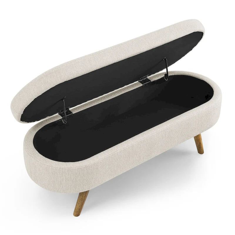 Banc de rangement ottoman ovale beige en lin avec pieds en bois d'hévéa et rangement caché