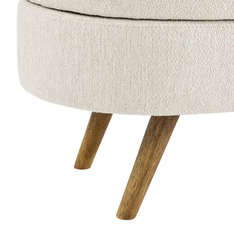 Banc de rangement ottoman ovale beige en lin avec pieds en bois d'hévéa et rangement caché