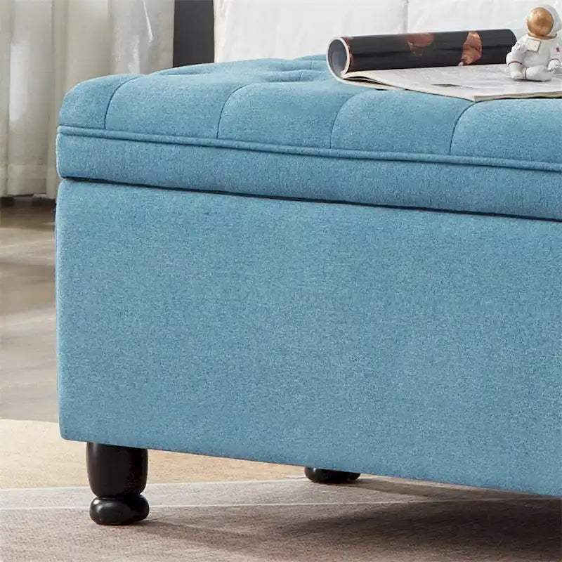 Banc de rangement capitonné avec couvercle à charnière et pieds tournés en bois